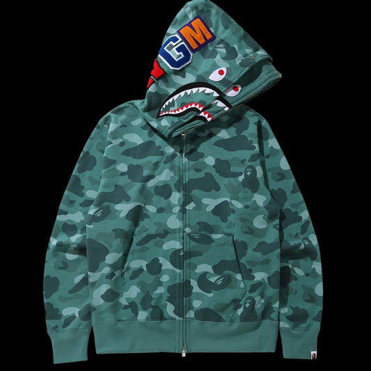 Green camouflage hoodie with colorful logo on hood against a white background